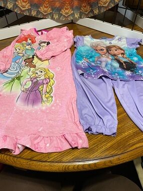 DISNEY. You’re buying the pj set and getting the gown free.